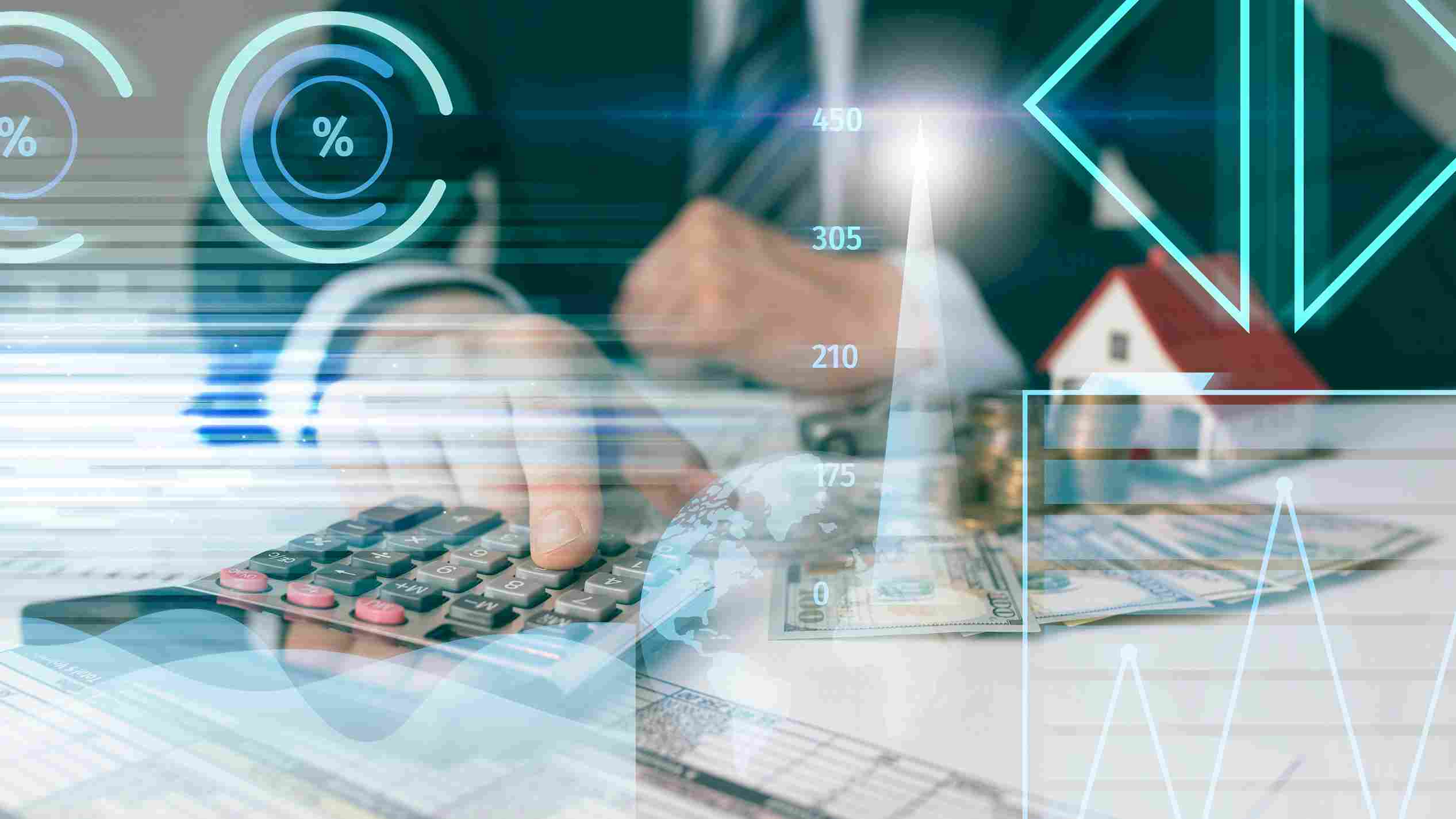 Businessman using calculator with digital finance graphics, symbolizing modern NBFC software
                           solutions in India